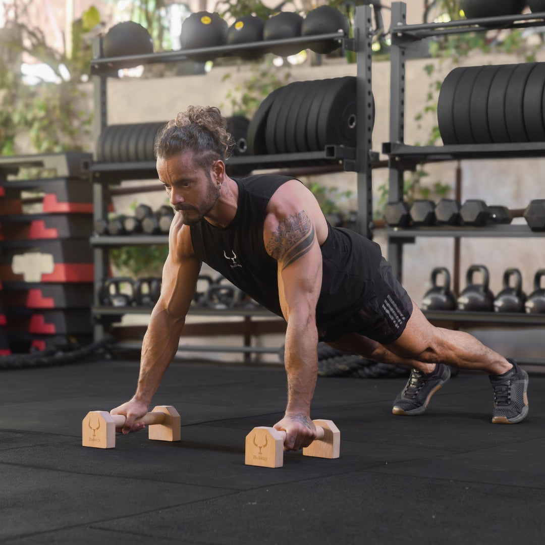 Man working out outdoors on rubber flooring tiles