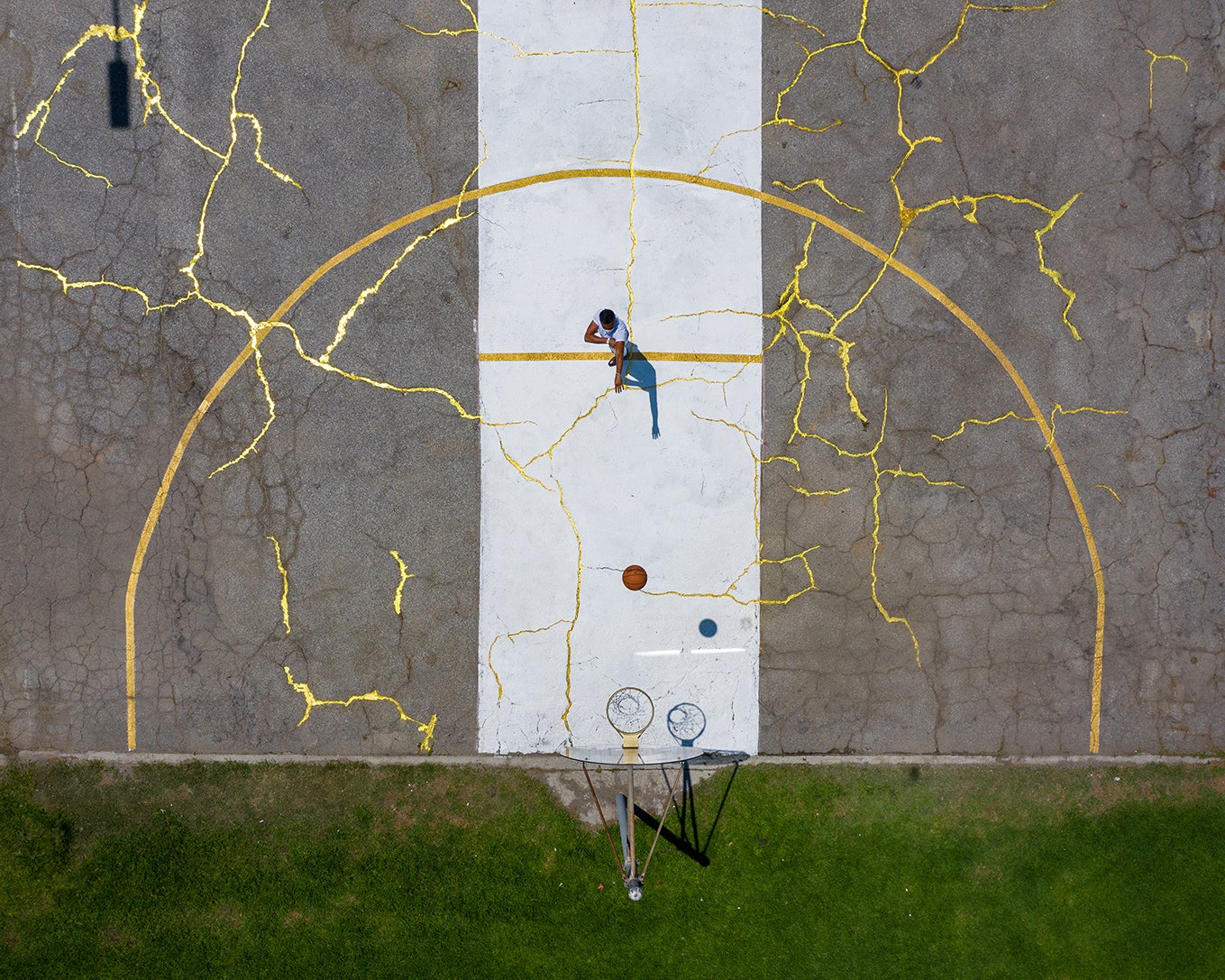 Using the Traditional Japanese Art of Kintsugi to Repair a Basketball Court Sports Flooring